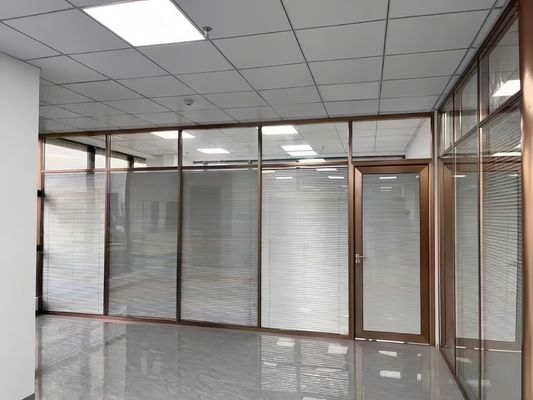 Gold Framed Dual-Level Glass Partition Wall with Blinds